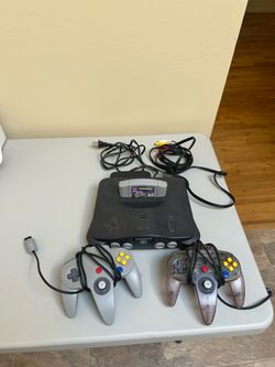 Nintendo 64 console with two controllers