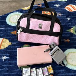 Nintendo DS with 5 games & case, complete with charger- Low Price. $40