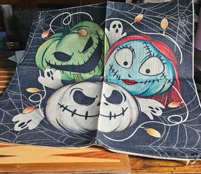 The Nightmare Before Christmas theme with Jack Skellington, Sally, and monster pumpkins on a dark spiderweb