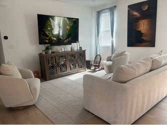 Living room sofa with two chairs