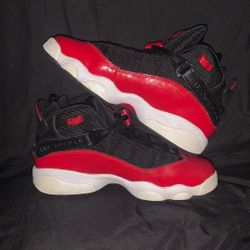 Jordan 6 Rings in a black, red, and white colorway. 