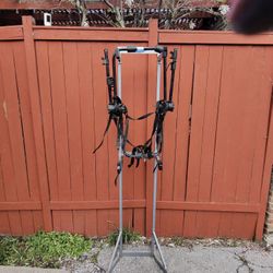 trunk-mounted bike rack for a car. And 2 Bike Upright Stands 