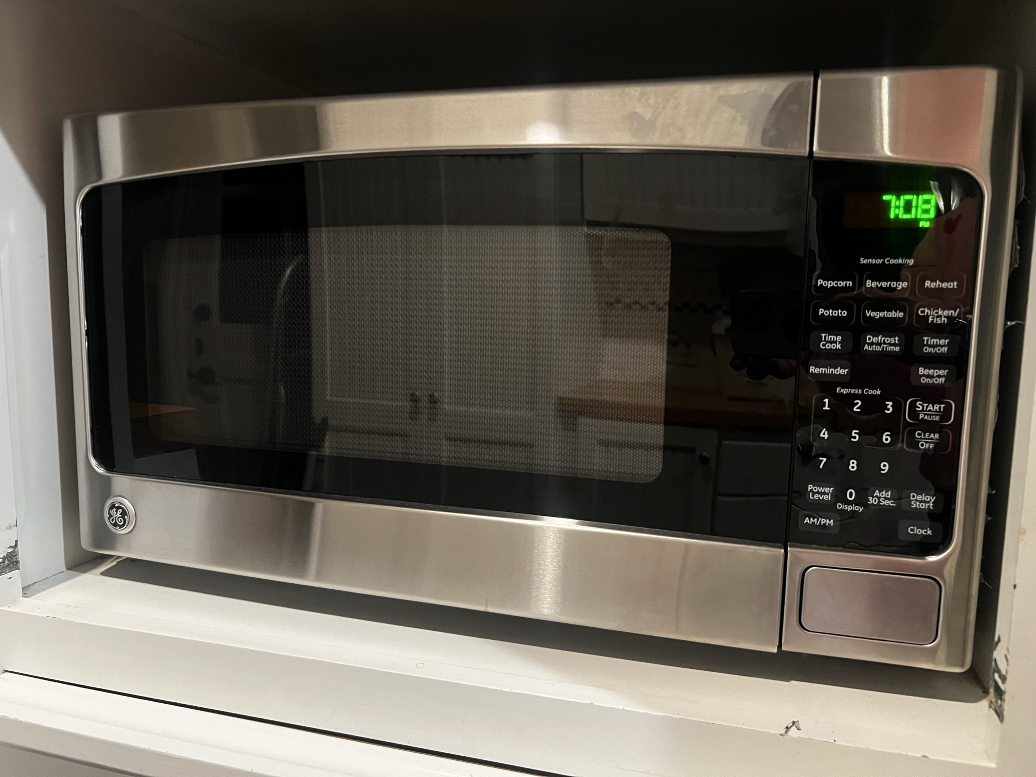 GE 2-cu ft 1200-Watt Sensor Cooking Controls Countertop Microwave (Stainless Steel)