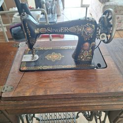 2 Singer Sewing Machines