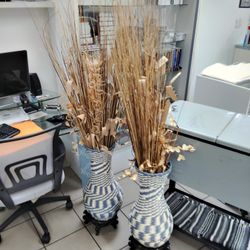 Plants In A Vase On Stands