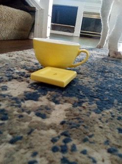 Yellow Ceramic Cup and Saucer Set