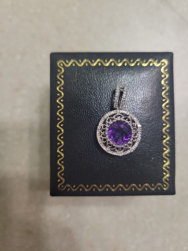 10 K White Gold Amethyst And Diamonds Pendant.  Weight Is 2.2 Grams 