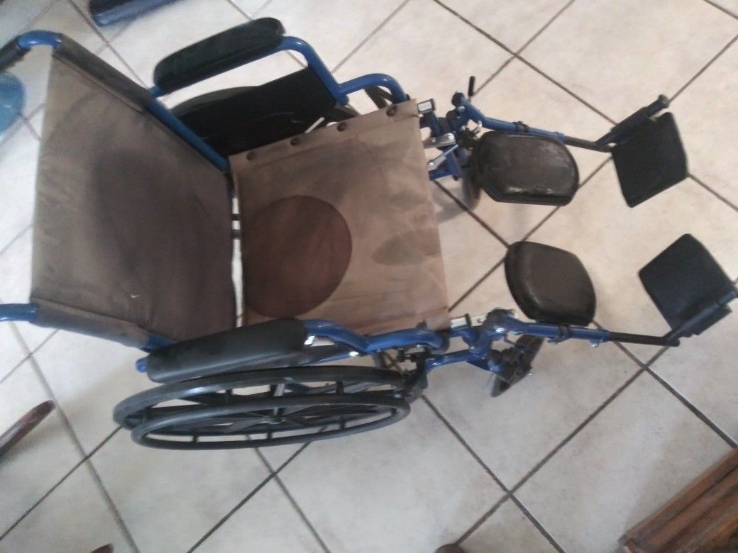 Blue Wheel Chair. Good Condition. $ 150.
