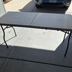 5’ x 25” x 28” high folding table with self locking legs