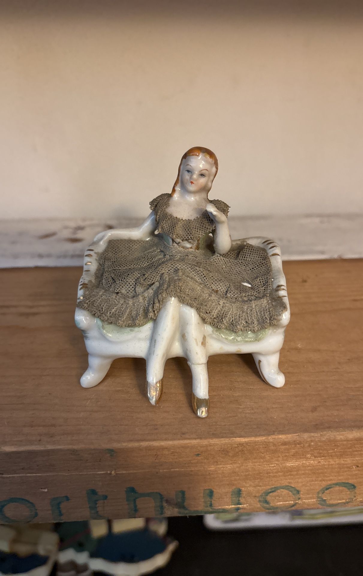 Lady and chair ceramic and fabric miniature