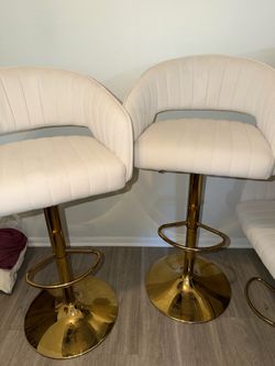 4 white and gold bar stools