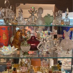 Perfume Bottles And Metal Curio Containers , five dollars and up. Inquire if interested.