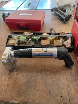 Omark powder actuated nail gun