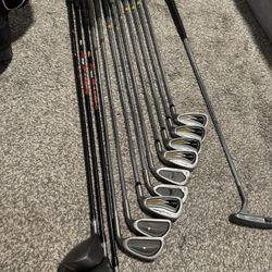 Gold Clubs, Bag, And Balls