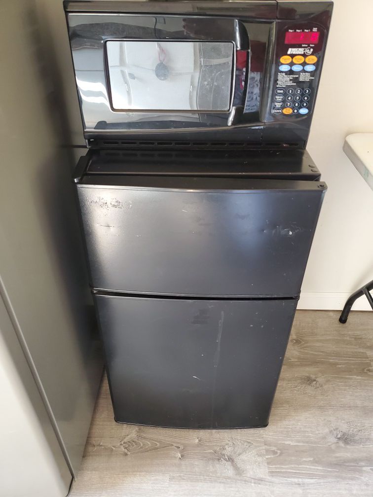 Mini fridge. Refrigerator with attached microwave