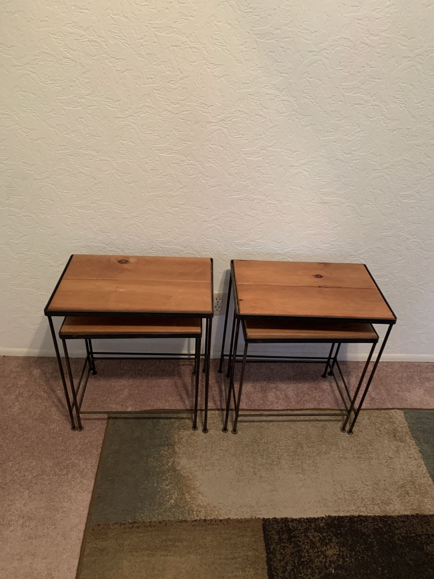 Two sets of wrought iron nesting tables in good condition. These are heavy duty.