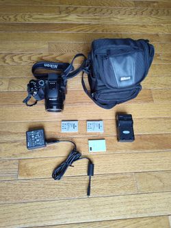 Nikon Coolpix P500 12.1 MP 36.0x Super Wide Optical Zoom + 3 batteries, charger, lens cap, and Nikon bag