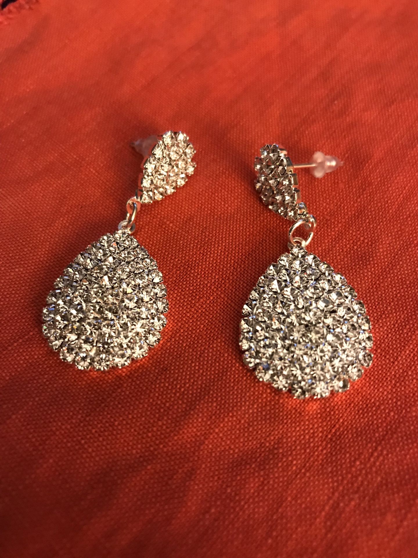 Clear rhinestone earrings. Silver tone.