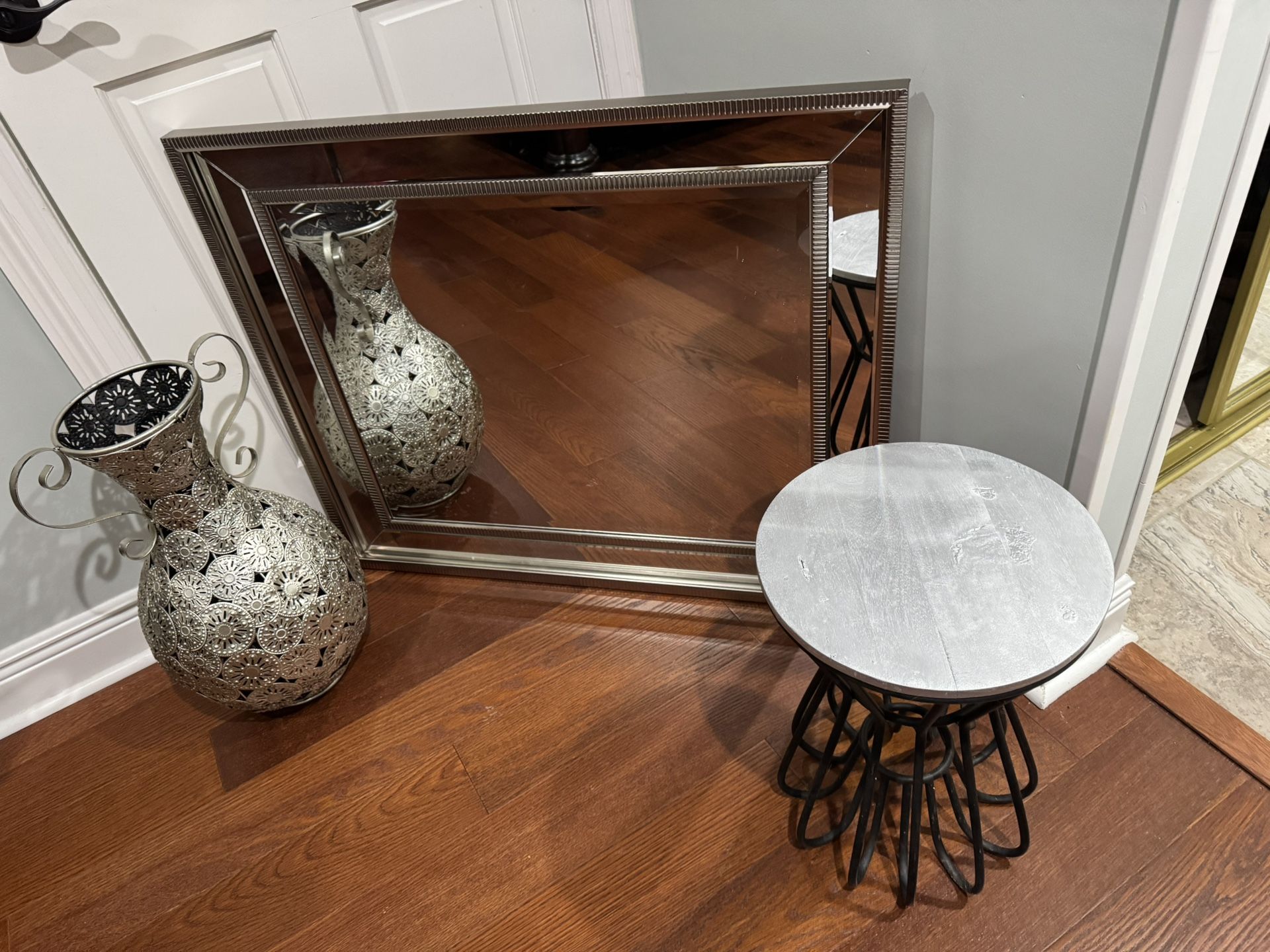 Mirrror, table and metal vase. Alls good condition $80 for alls