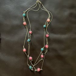 Pink and Teal Beads On A Gold Chain 
