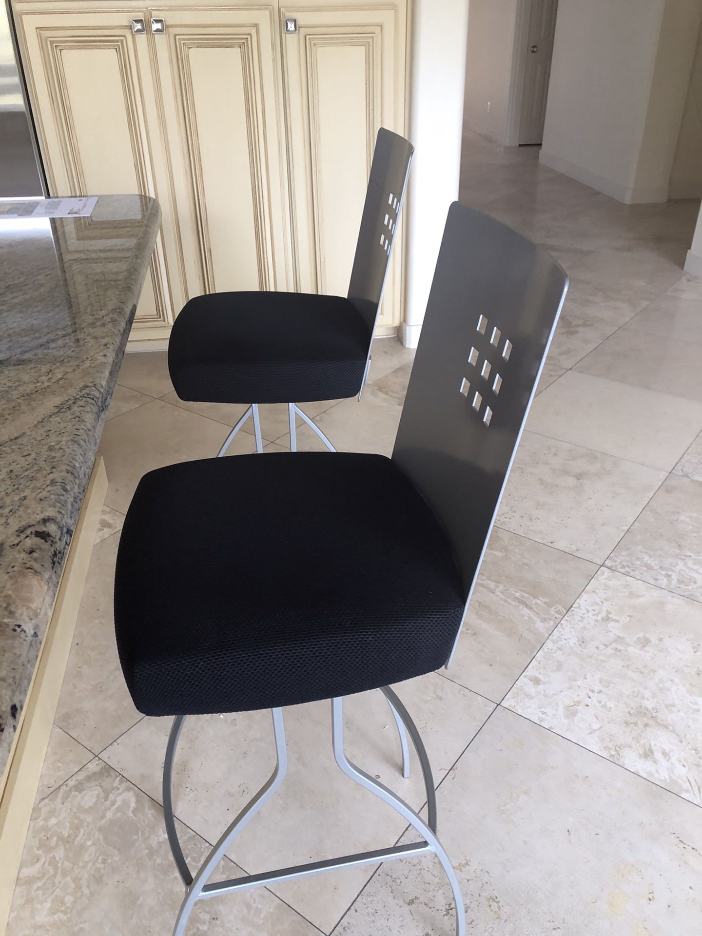 2 metal swivel bar stools $ 155.00 (30” high - charcoal black cushions- )