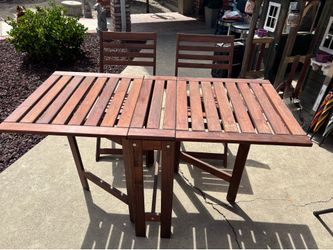 Folding wood table and chair set