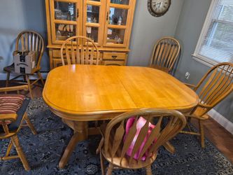 Dinette set one table six chairs leaf and Hutch free to a good home great condition