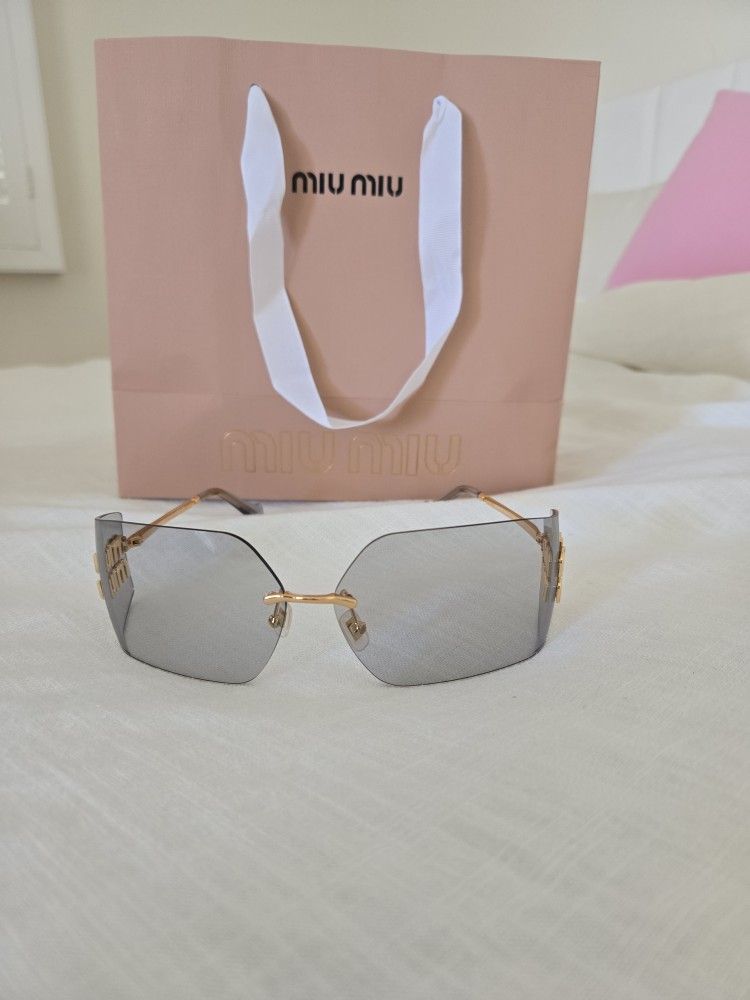 Miu Miu Irregular sunglasses