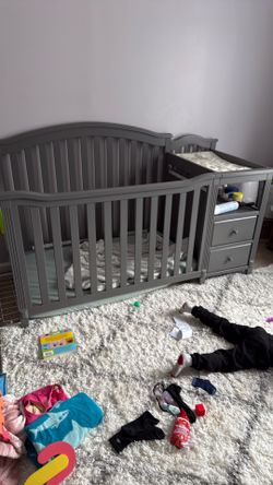 Crib with changing table