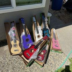 Acoustic Guitar 🎸 22 Inch.  $25 Each 