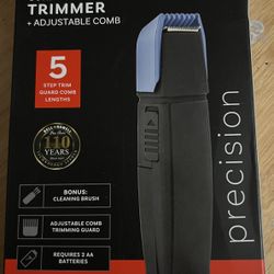 BRAND NEW IN BOX Bell & Howell Cordless Trimmer + Adjustable Comb – New in Box Bell &Howell Cordless Trimmer + Adjustable Comb Black/Blue