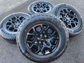 18" Ford F-150 New Gloss Black OEM Wheels And Tires