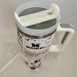 This is a 40 oz (1.18 L) Stanley Quencher H2.0 thermos mug with a Nightmare Before Christmas themed