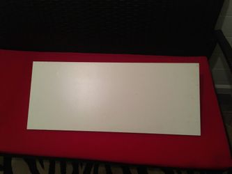 white wall shelf and stand