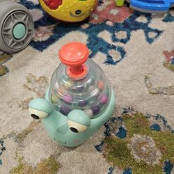 B. toys - Light Up Snail Ball PopperBaby Toy with Glowing Effects & Easy-Grip Handle