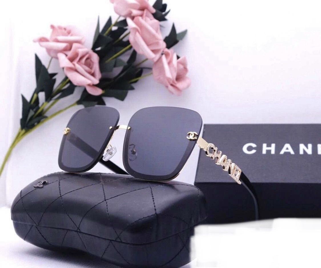 Chanel Sunglasses Black Frame Gold And Black Grips for Sale in