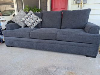 Blue sofa with pillows