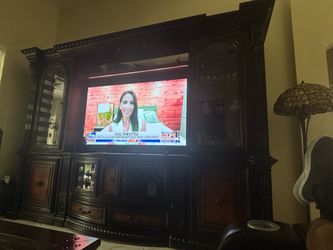 Large furniture to hold TV.