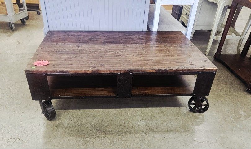 Shlenker Coffee Table With Casters 