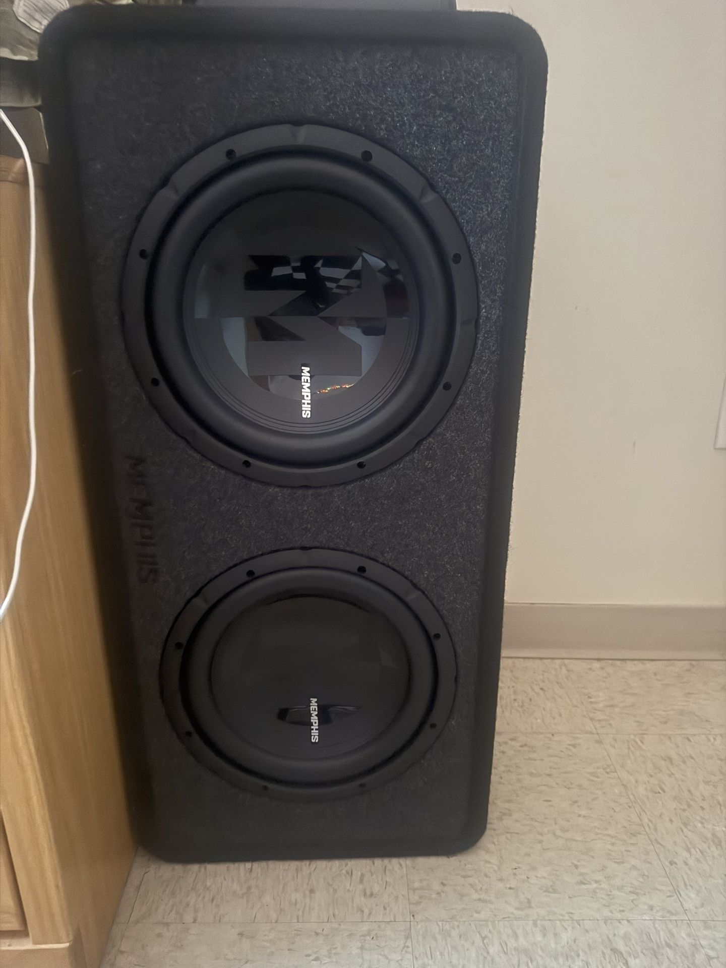 Dual 12 inch Memphis subwoofer + 600 watt amp