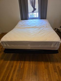 Adjustable bed frame with remote