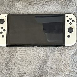 Nintendo Switch Oreo, Black and white. And exceserise.  