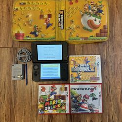 Blue Nintendo 3DS XL + 3 Mario Games + Case
