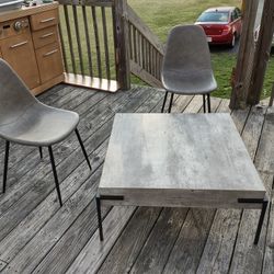 Safavieh Furniture. Brand New with two matching chairs.