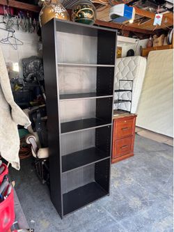 Dark brown 11 1/2 “ 5 -layer shelf wood bookcase .