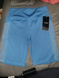 NEW WITH TAG WORKOUT COLOR: TEAL SHORTS WITH POCKETS  SIZE: S/M  For $10