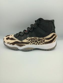 Woman's Jordan 11 Animal Instinct 