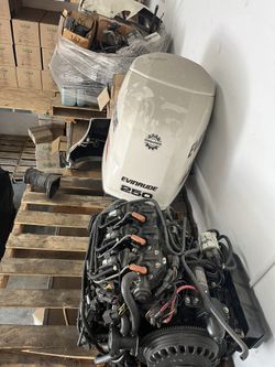Lot Of Two Evinrude 250 Motors Selling As Is For Parts