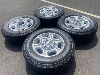 2025 Factory 18” Ford f250 Wheels & AT tires like new