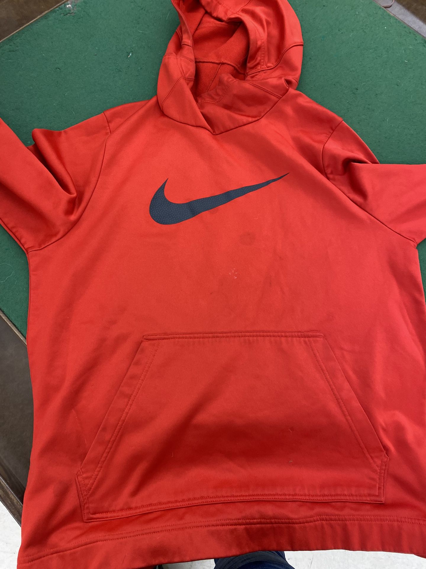 L red Nike sweatshirt